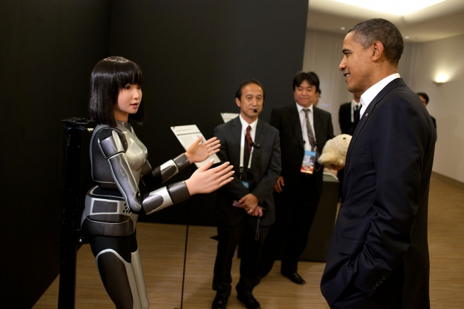 president_barack_obama_observes_the_cybernetic_human_robot_prior_to_the_start_of_the_apec_dinner_at_the_pacifico_yokohama_conference_center_in_yokohama