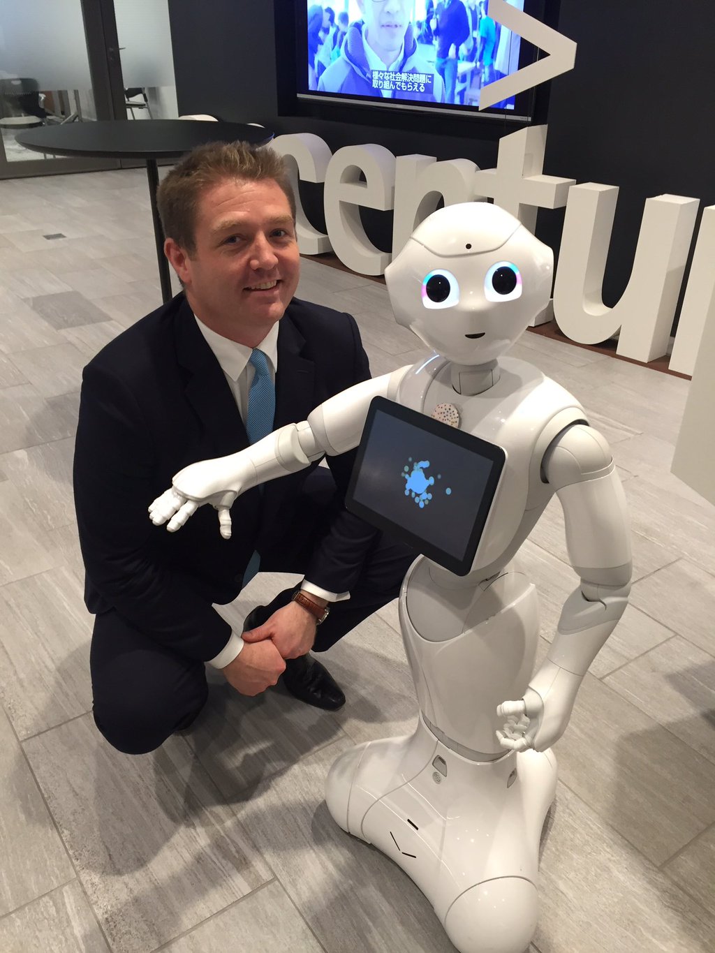 Accenture’s Peter Lacy with Pepper the robot