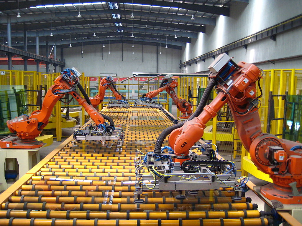 industrial robots moving glass