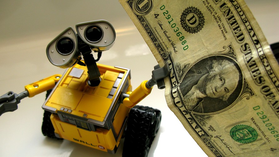 robot with dollar bill