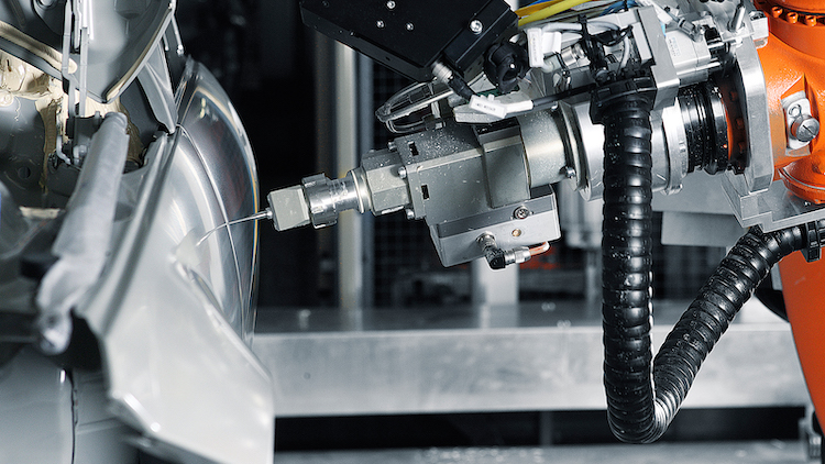 Kuka showcases new fully automated sealing and damping system at Audi
