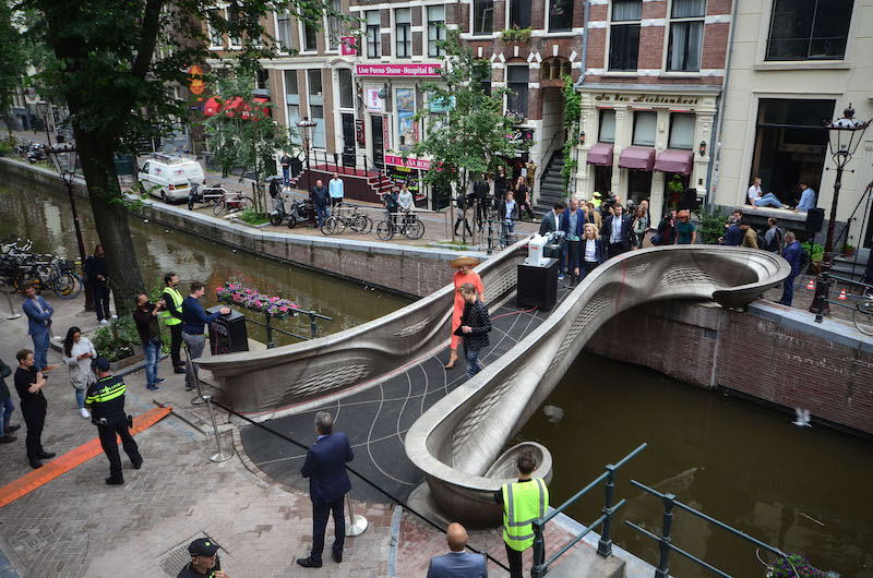 MX3D’s 3D-printed bridge unveiled by robot and Dutch queen in Amsterdam