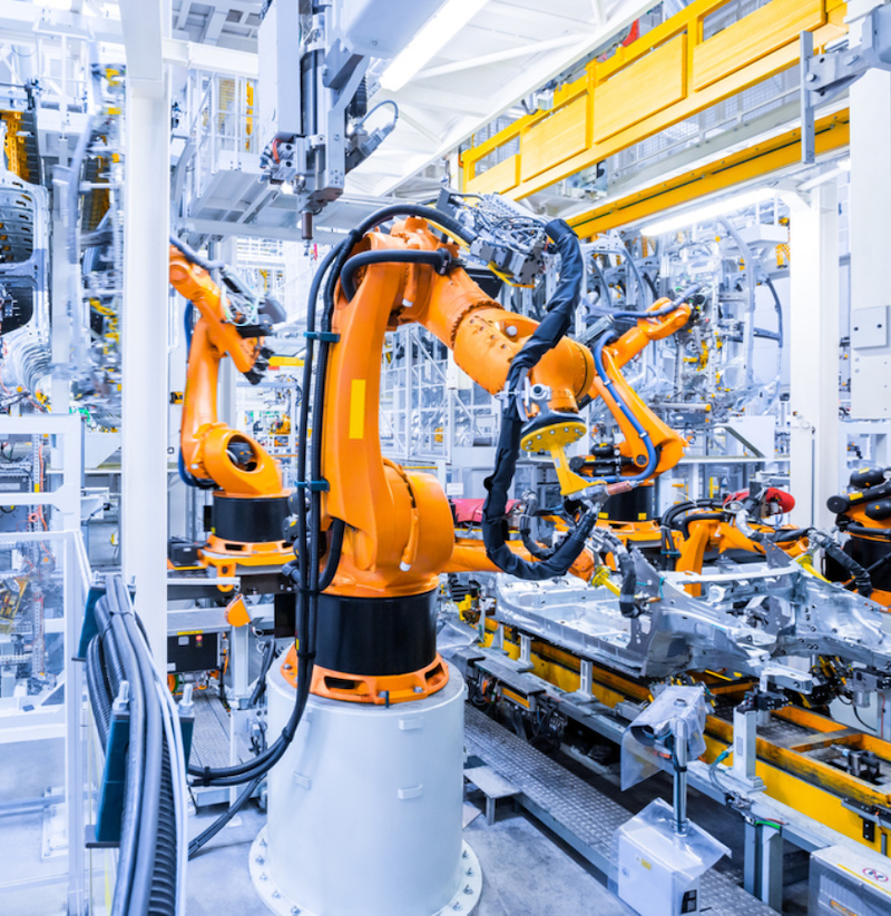 Factory Visit: Investment bankers tour client’s robot-filled machine shop
