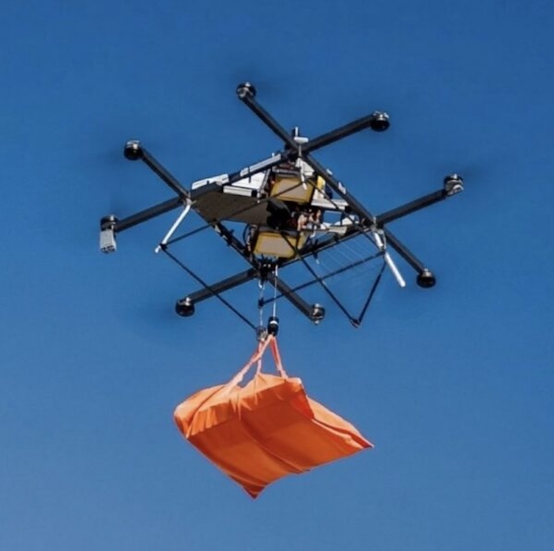 Flytrex drone hovering above a Nash courier vehicle in Dallas-Fort Worth