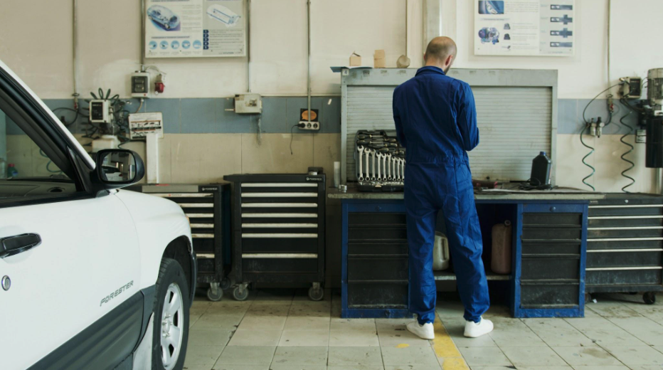 Mechanic working in a garage.